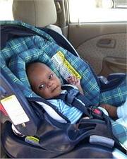 baby in a carseat